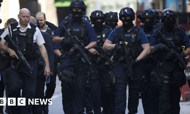 96348121 armedpolice4juneafpgetty.jpg