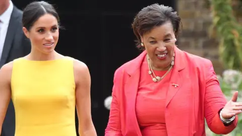 Getty Images Duchess of Sussex and Baroness Scotland at the Your Commonwealth Youth Challenge reception in London - 5 July 2018