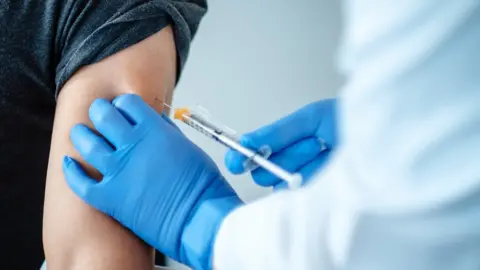EPA Someone having a vaccine