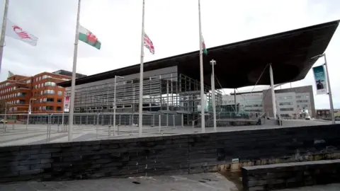 Getty Images Flags at half mast at the Senedd