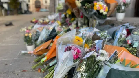 Lee Hopkins flowers outside Jersey Royal Court