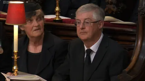 BBC Mark Drakeford attends funeral service