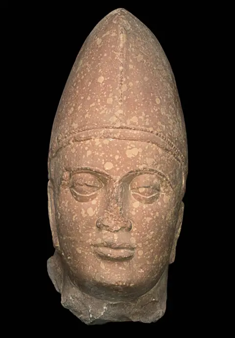 National Museum, New Delhi A sculpture of a Kushan king made of spotted red sandstone