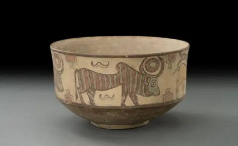 TAPI Collection of Praful and Shilpa Shah, Surat A terracotta pot with a bull and other animals on it, 3500–2800 BC