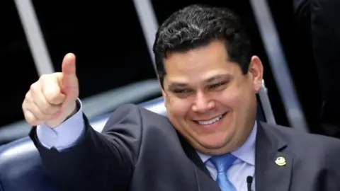 Reuters President of the Senate Davi Alcolumbre gestures during a session to vote on the pension reform bill at the Federal Senate in Brasilia, Brazil, October 1, 2019.